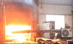 Production process of swing bearing